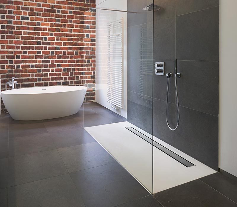 Spacious  new design  attic bathroom with glass walk in shower, bathroom and high gloss tiling