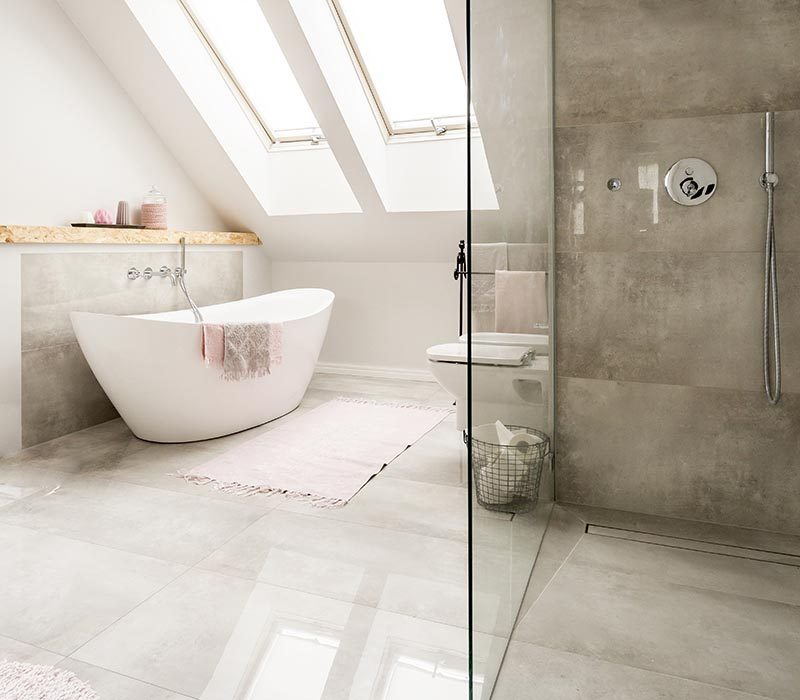 Spacious  new design  attic bathroom with glass walk in shower, bathroom and high gloss tiling